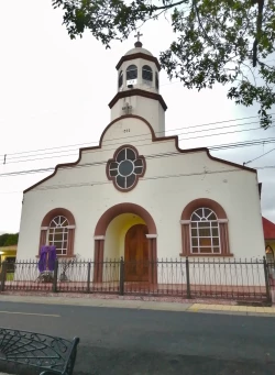 San Lorenzo de Flores Catholic church. A white building with colorful windows